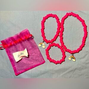 Hot pink 3-pc. bead choker, anklet, and bracelet set with rainbow charms.